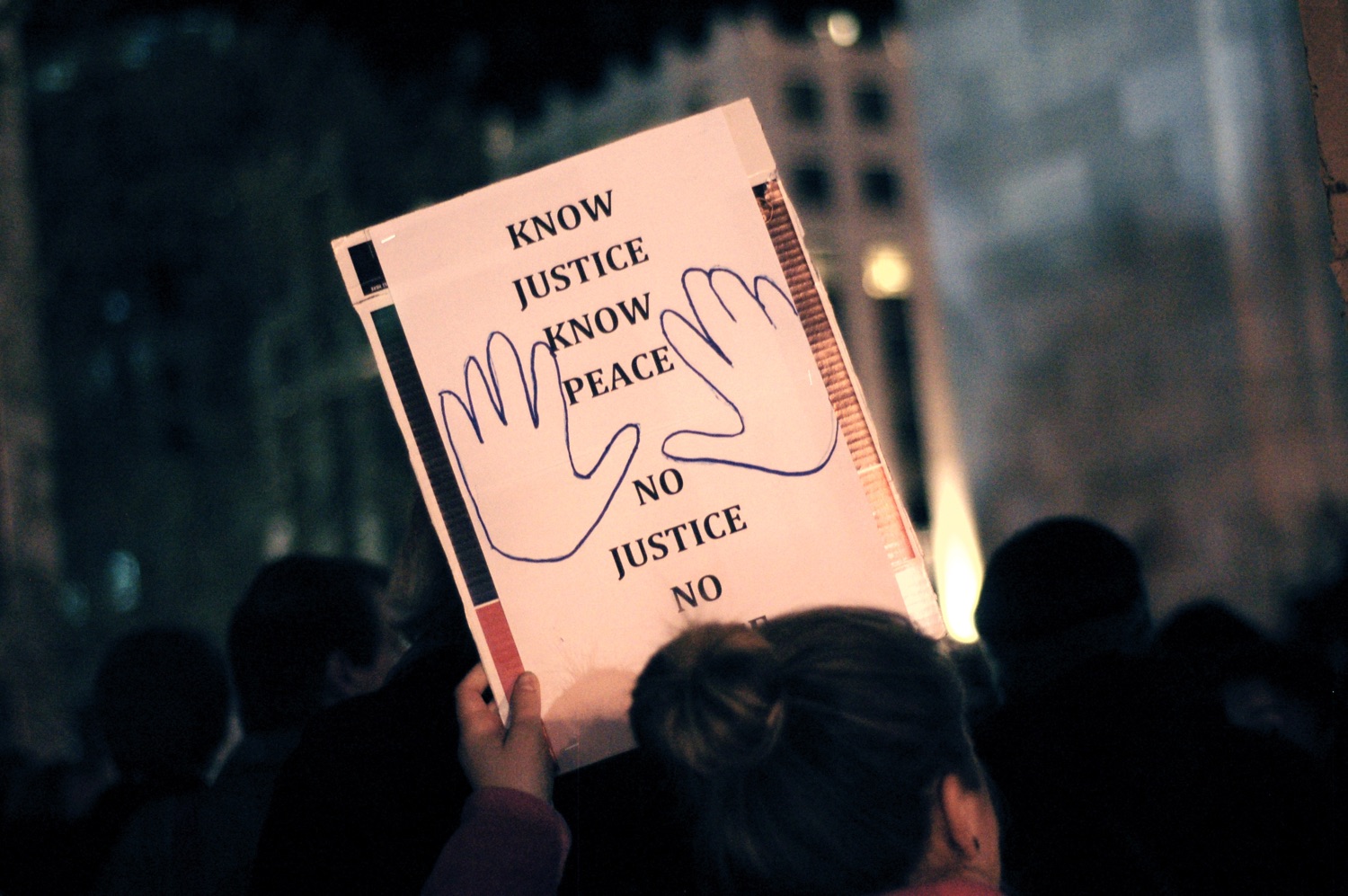 Protest sign: Know Justice,Know Peace / No Justice, No Peace